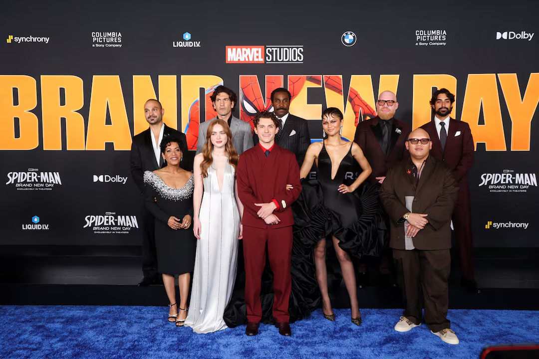 The cast and filmmakers of Spider-Man: Brand New Day stand together at the film’s premiere.