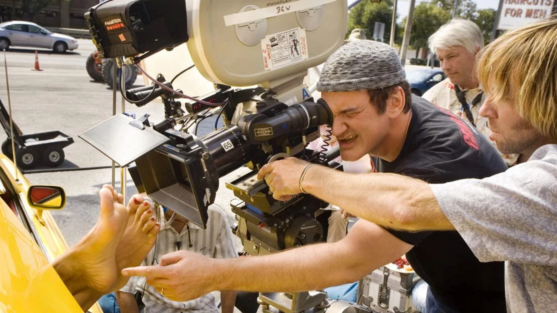 Quentin Tarantino at the camera on a Los Angeles street