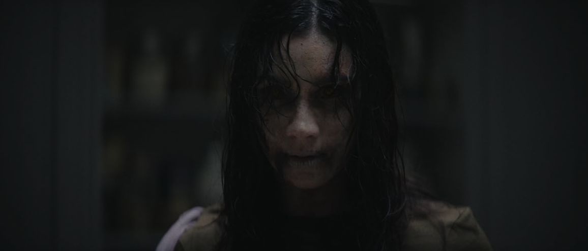 A bloodied survivor in Evil Dead Burn