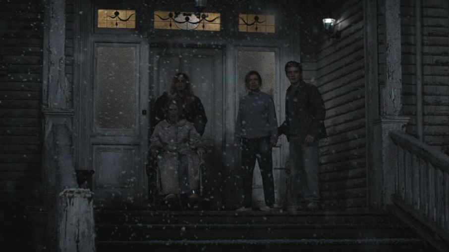 A tense standoff inside a smoke-filled house in Evil Dead Burn