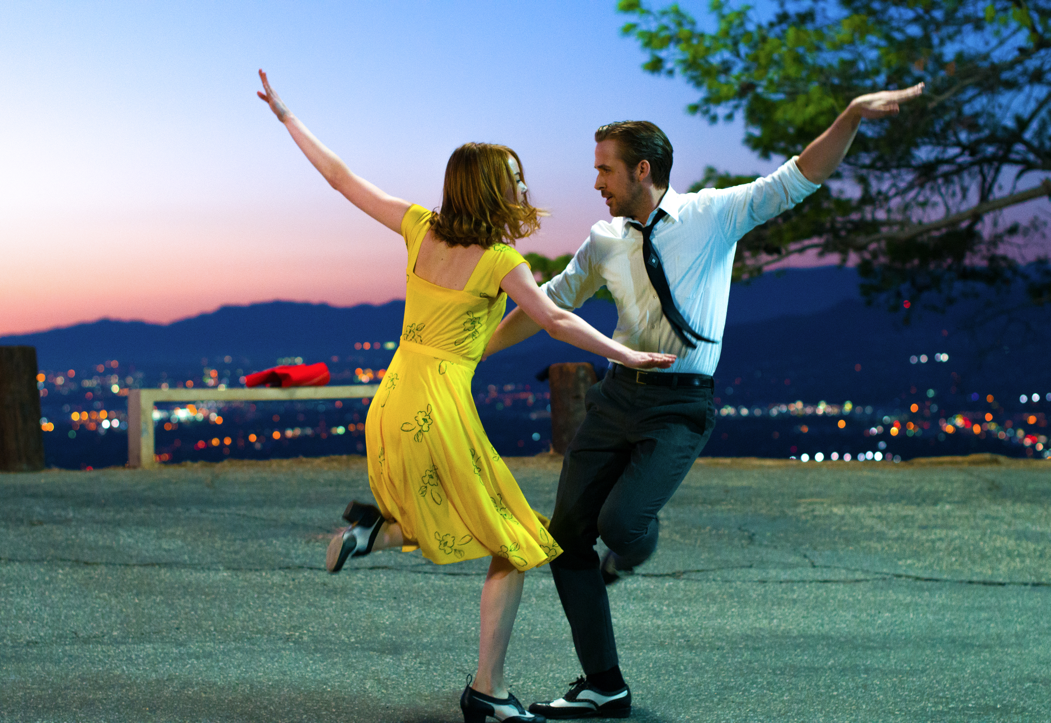 Emma Stone and Ryan Gosling dance at sunset above Los Angeles in La La Land.