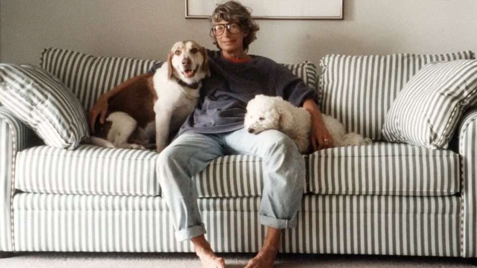 Mary Oliver at home with her two dogs