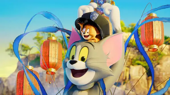 Tom runs beneath hanging lanterns with Jerry riding on top of his head.