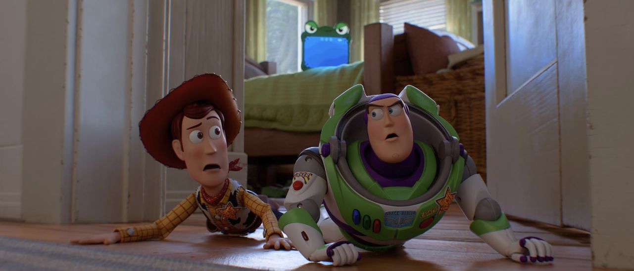 Woody and Buzz peering around a doorway in Toy Story 5